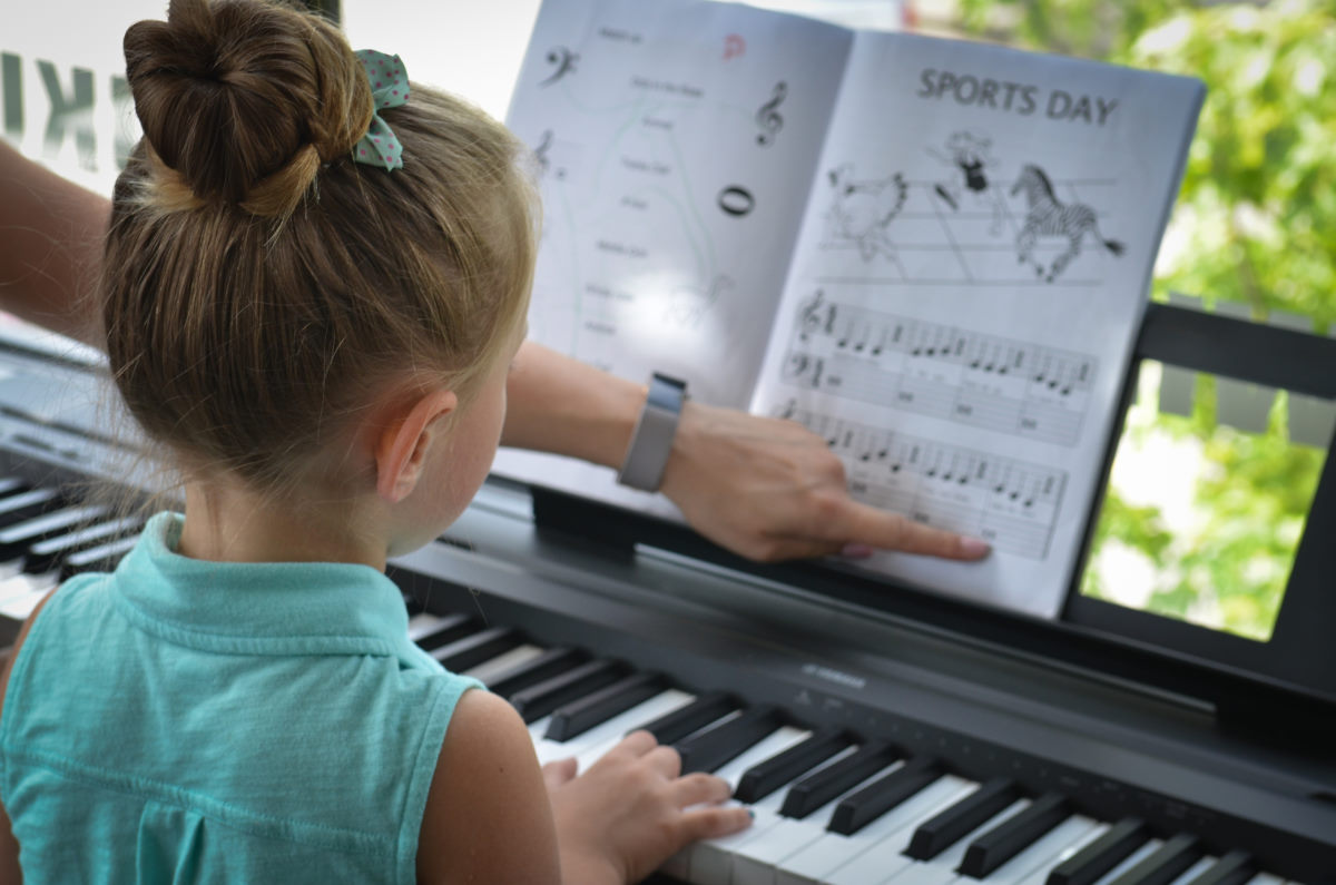 girl reading sheet music