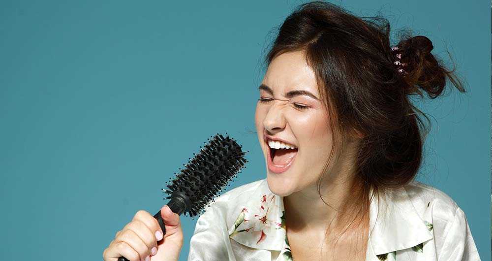 singing into the hairbrush