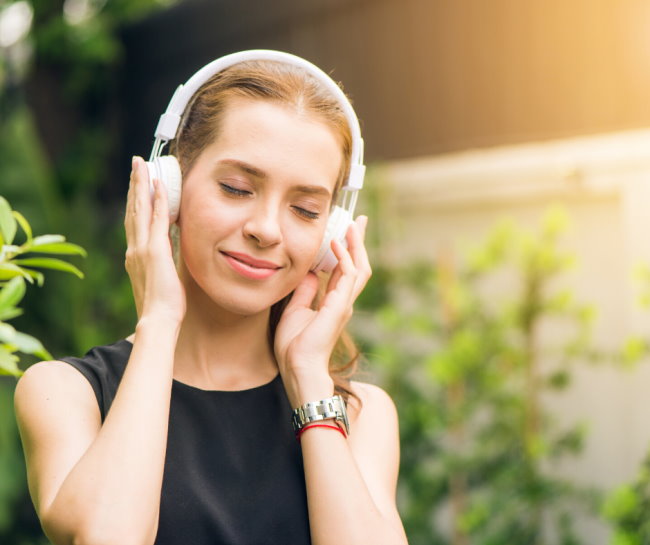 Woman listening to headphones