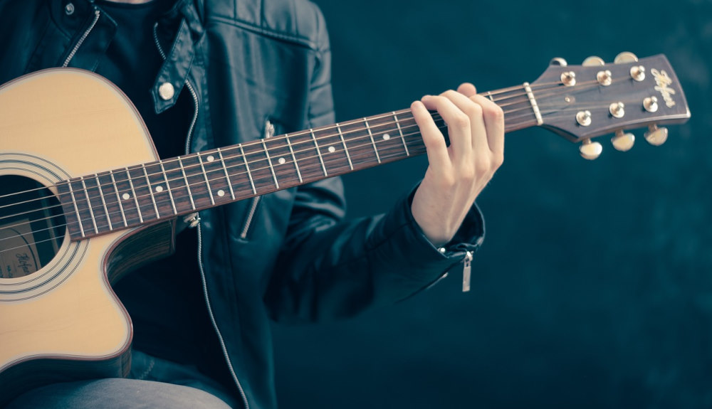 man playing guitar