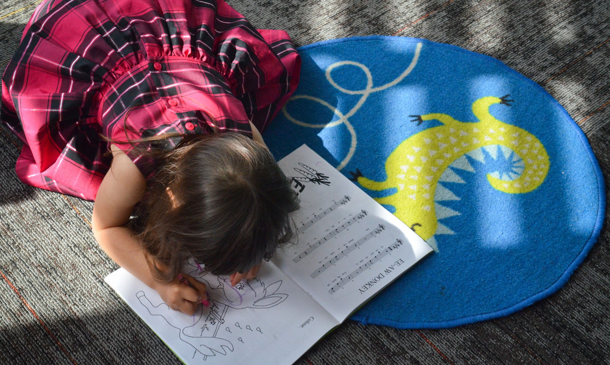 young girl in music class